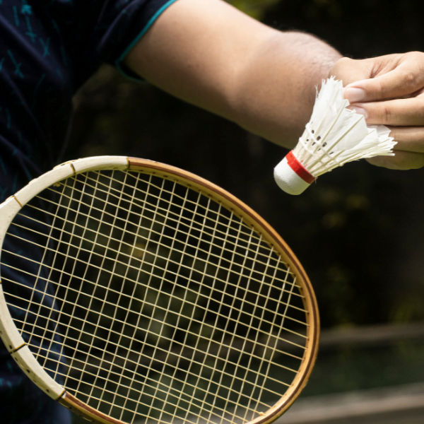 Serving a game of badminton