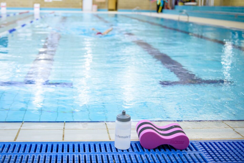 Bluecoats swimming pool with water and float at the side