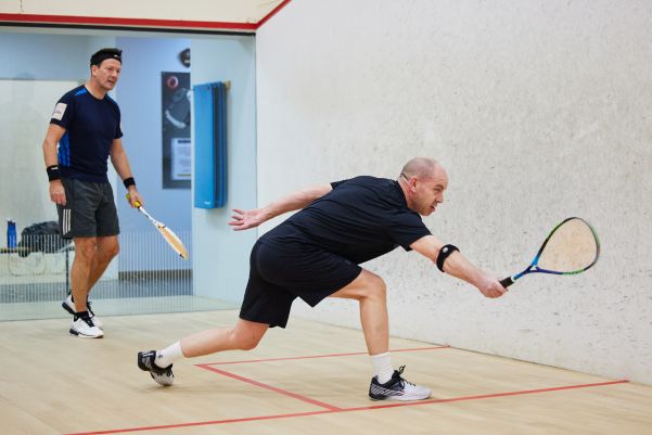 two men playing squash