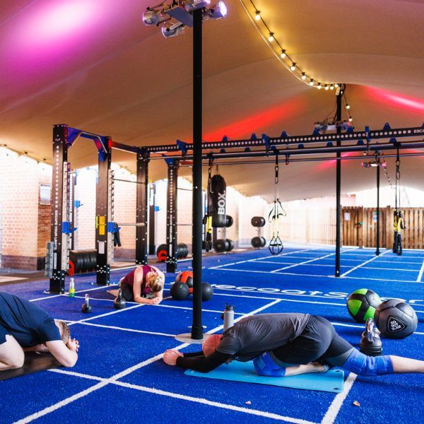 People working out in Bluecoat Sports fitness yard
