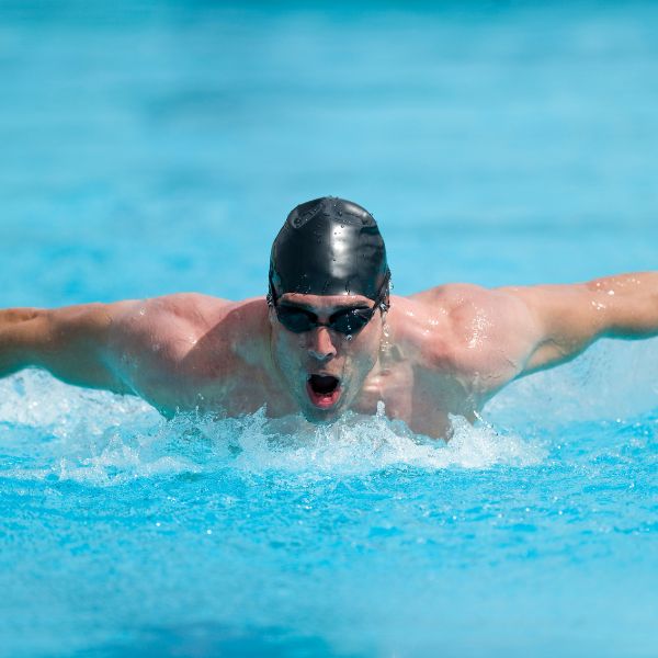 Person swimming butterfly stroke