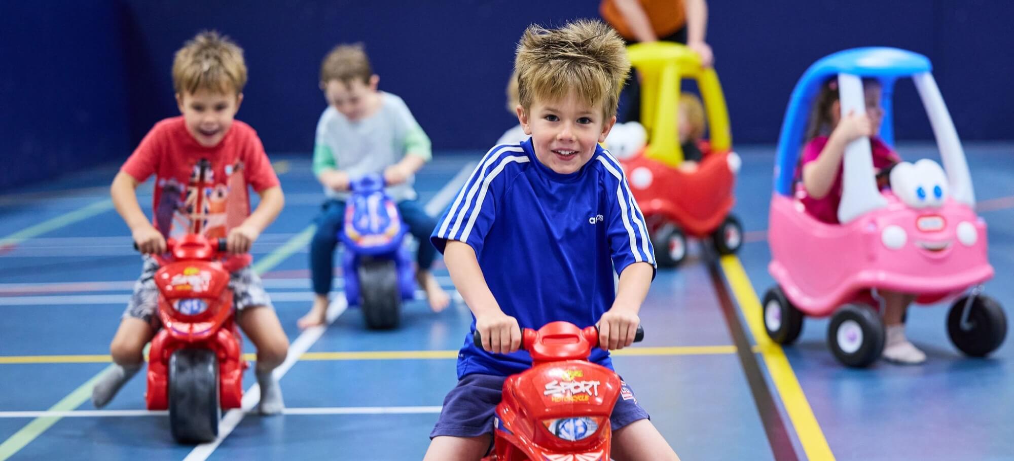 Kids riding bikes and trikes