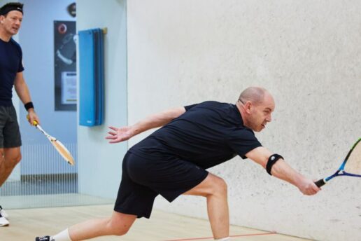 two men playing squash at bluecoat sports