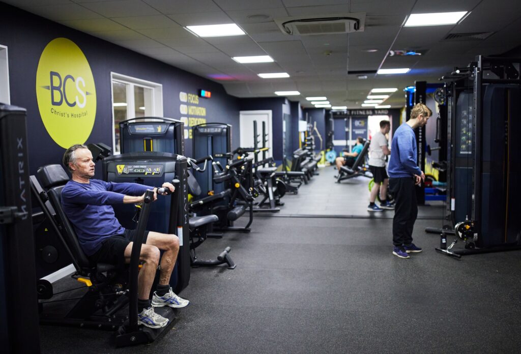 People using gym equipment at Bluecoat Sports gym