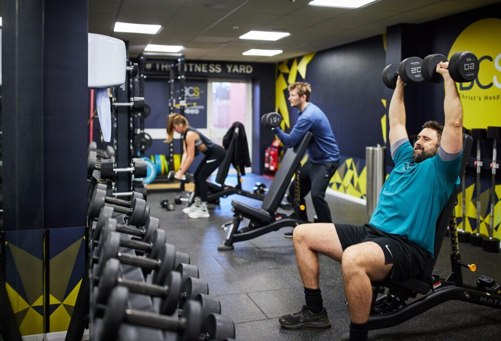 People using free weights at Bluecoat Sports gym