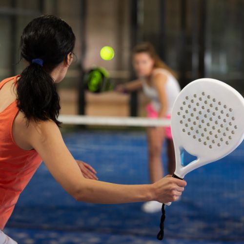 two people playing padel