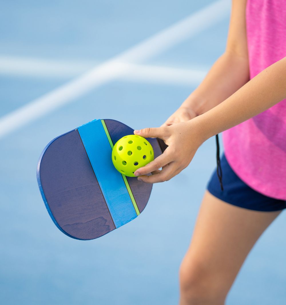 person about to serve in pickleball