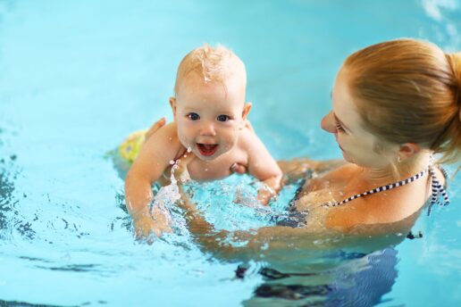 mum and baby in swimming pool