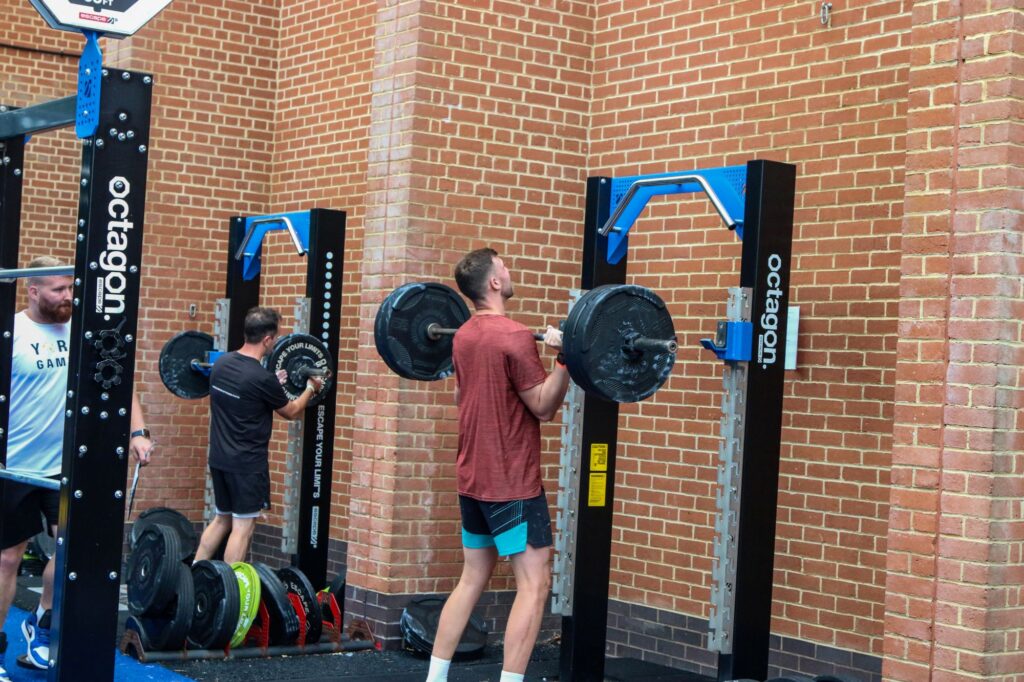 man performing barbell press