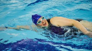 woman swimming smiling