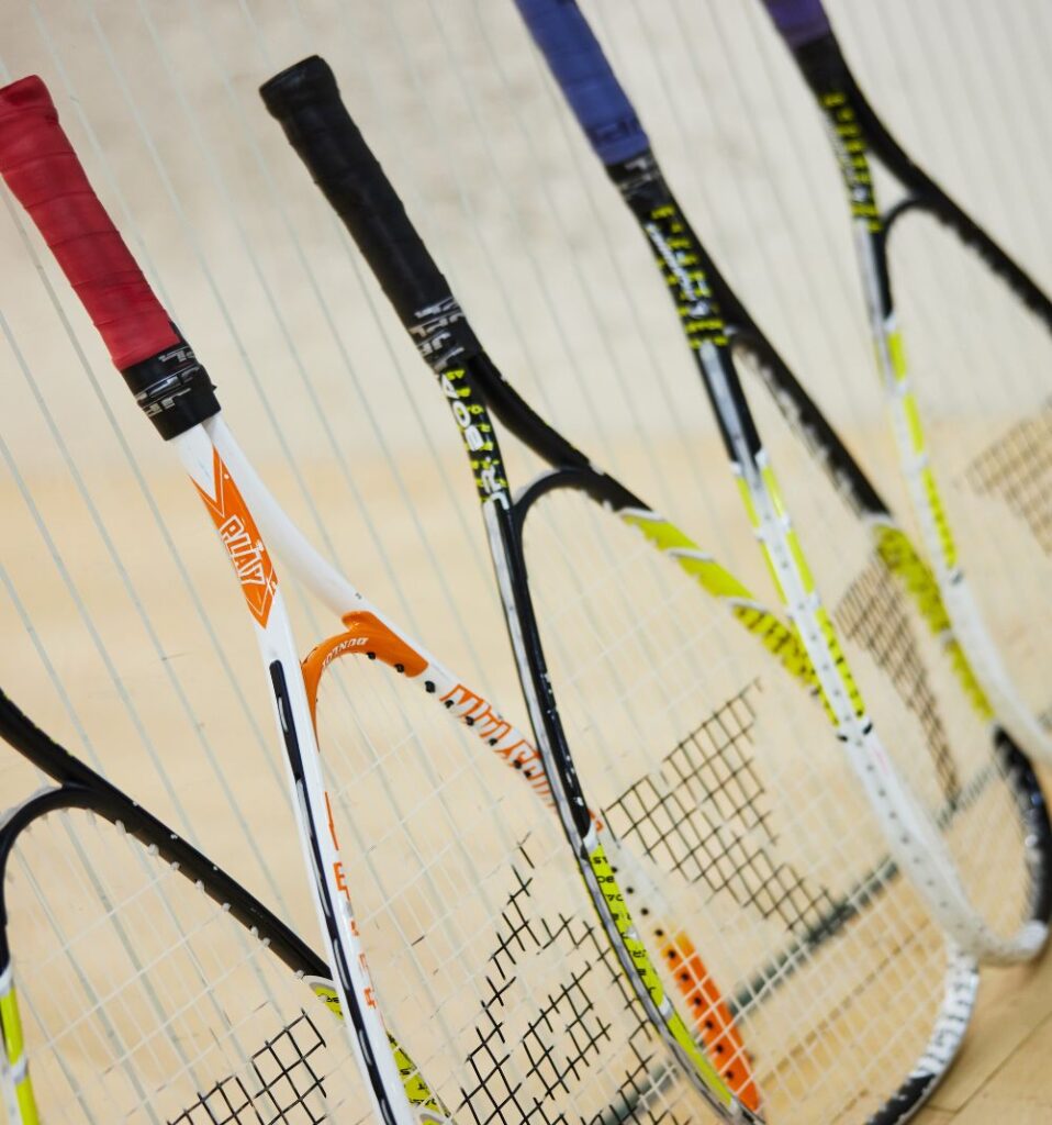 squash rackets lined up