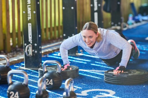 woman doing press ups in outdoor fitness yard