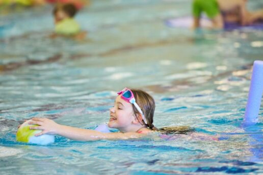 children playing in the swimming pool at bluecoat sports