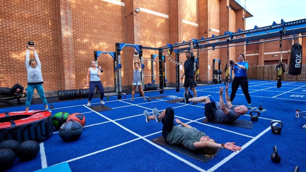 outdoor gym class in bluecoat sports fitness yard