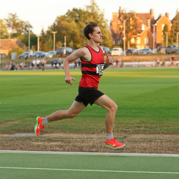man-running-on-athletics-track