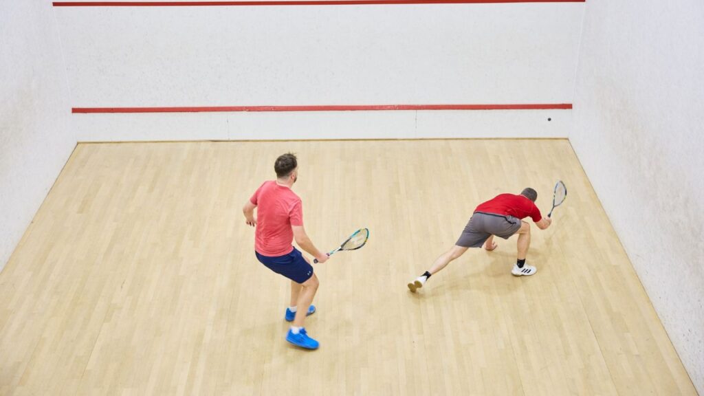two males playing squash at bluecoat sports